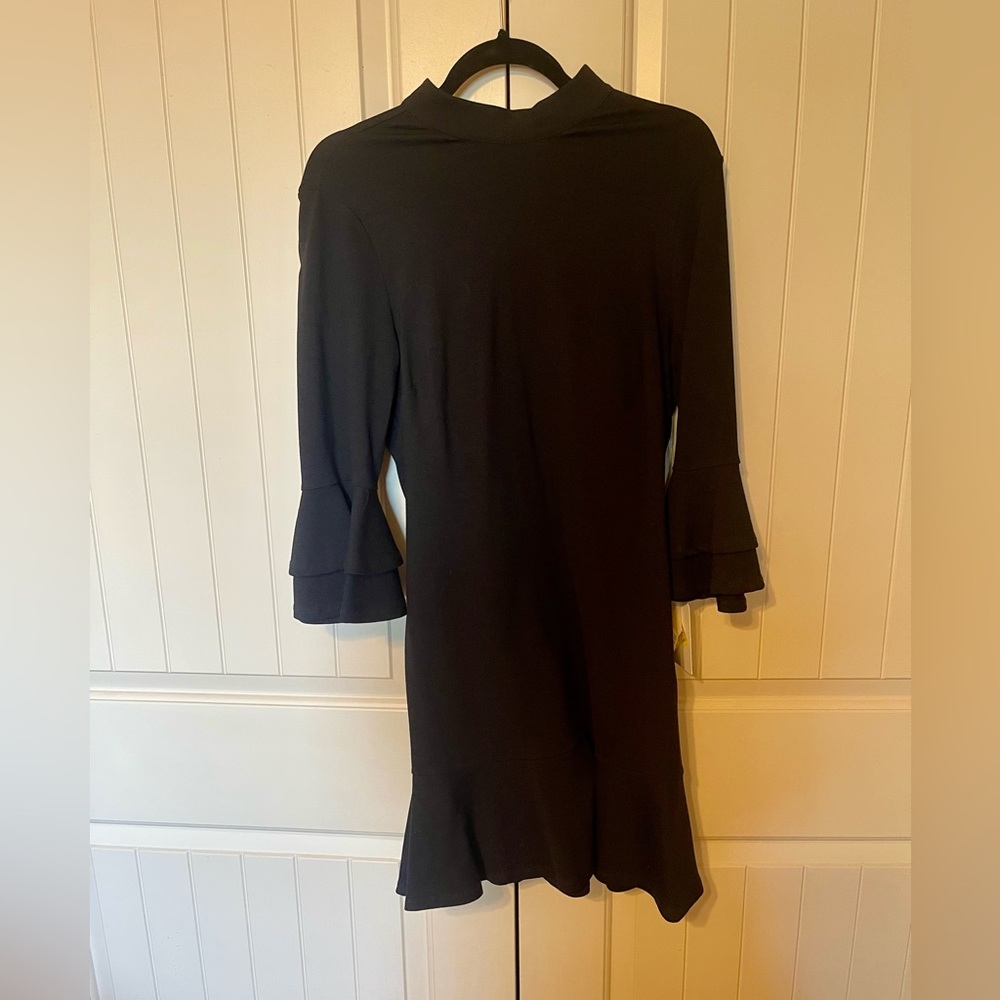 LOVE & PIECE SECRET CHARM BLACK DRESS WITH BELL SLEEVES.FITS LIKE A SIZE 6.